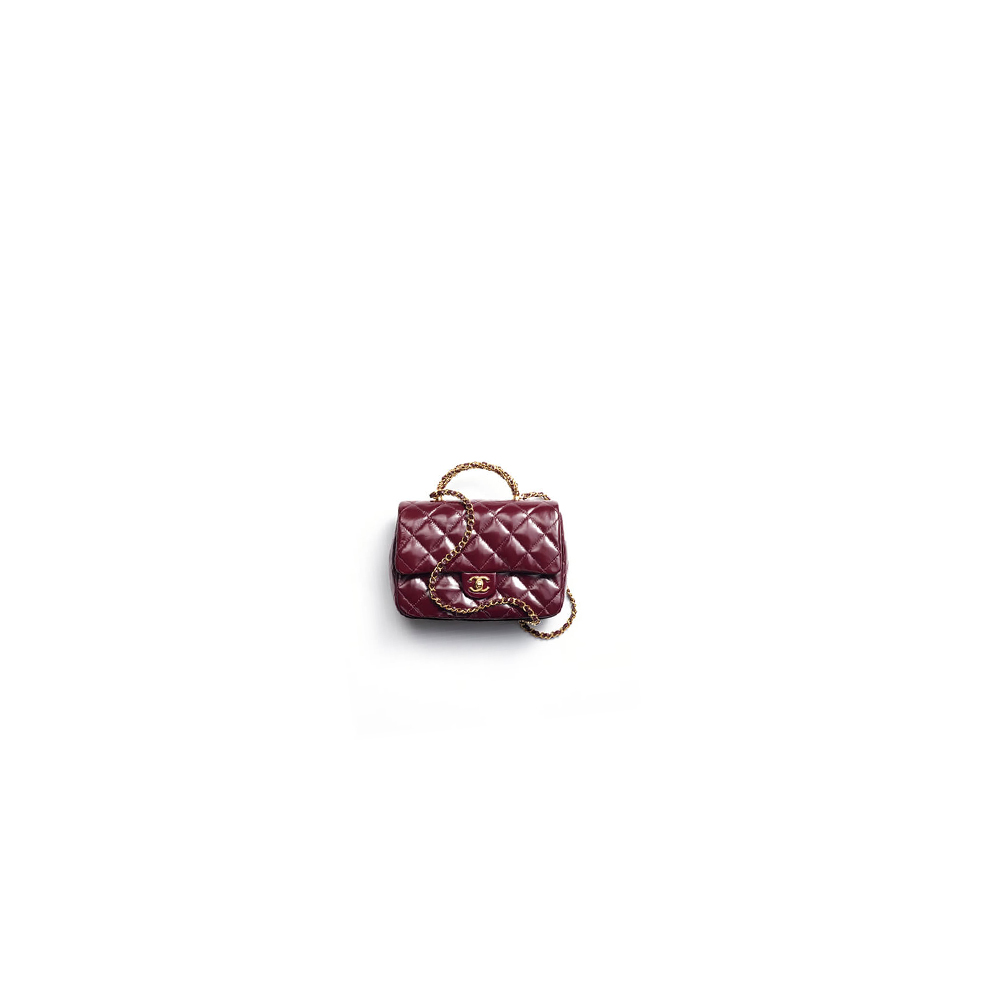 Ch*el flap bag with top handle